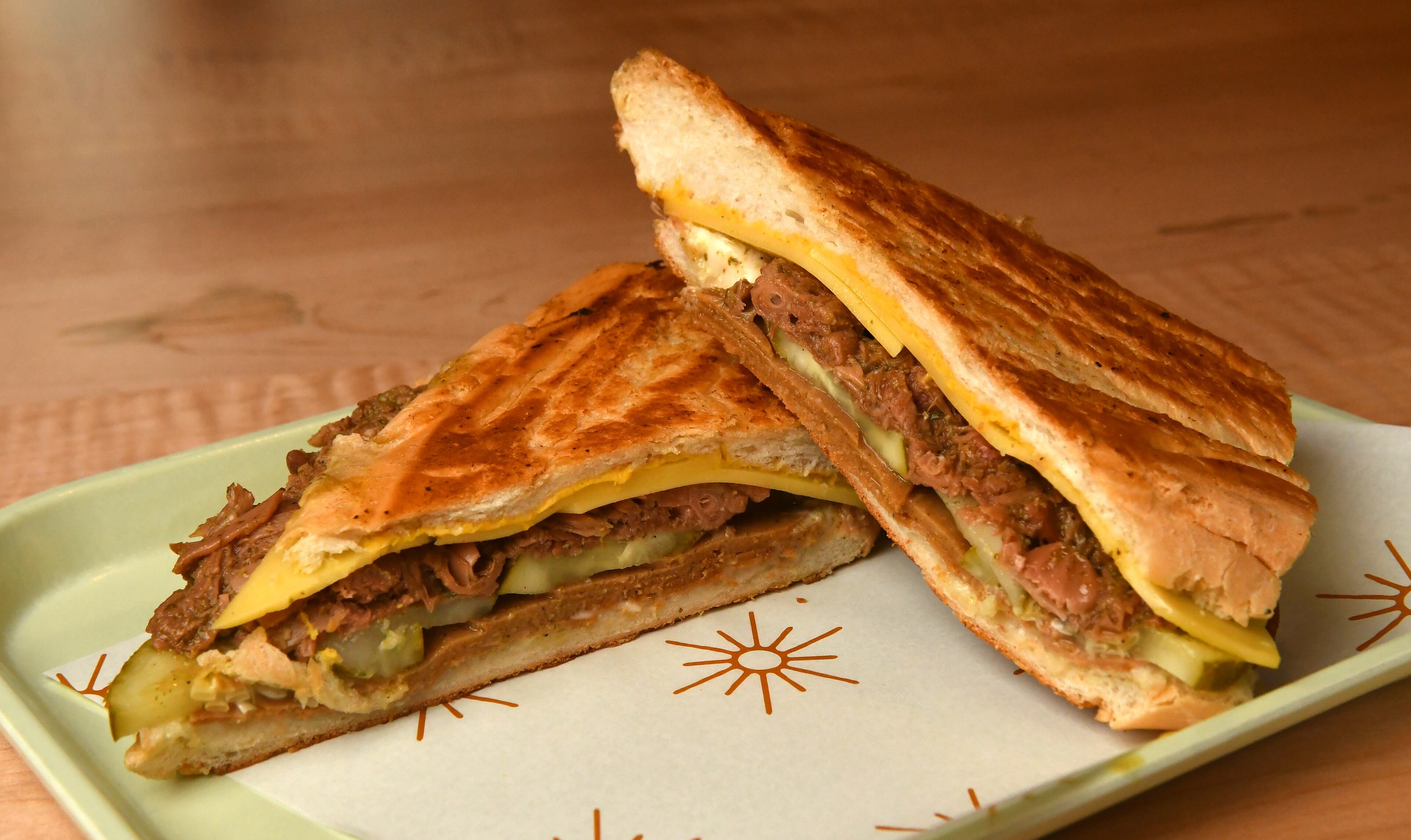 Vegan Cuban Sandwiches are ready to eat at La Semilla. A former pop-up, La Semilla is the go-to restaurant for plant-based Latin American fare. (Chris Hunt for the AJC)