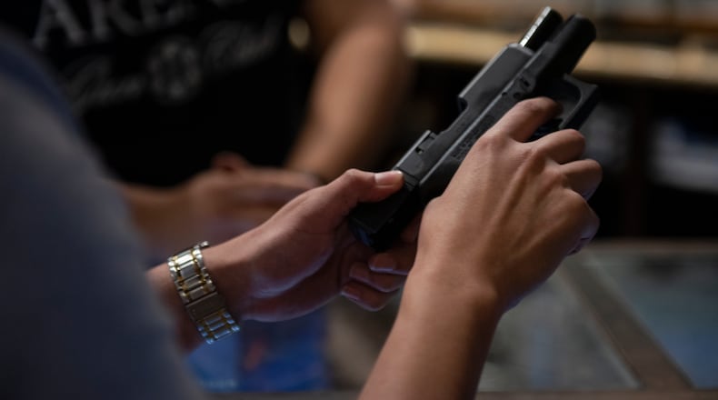 FILE — A pistol user at a firing range is shown in a file photo. (Callaghan O'Hare/The New York Times)