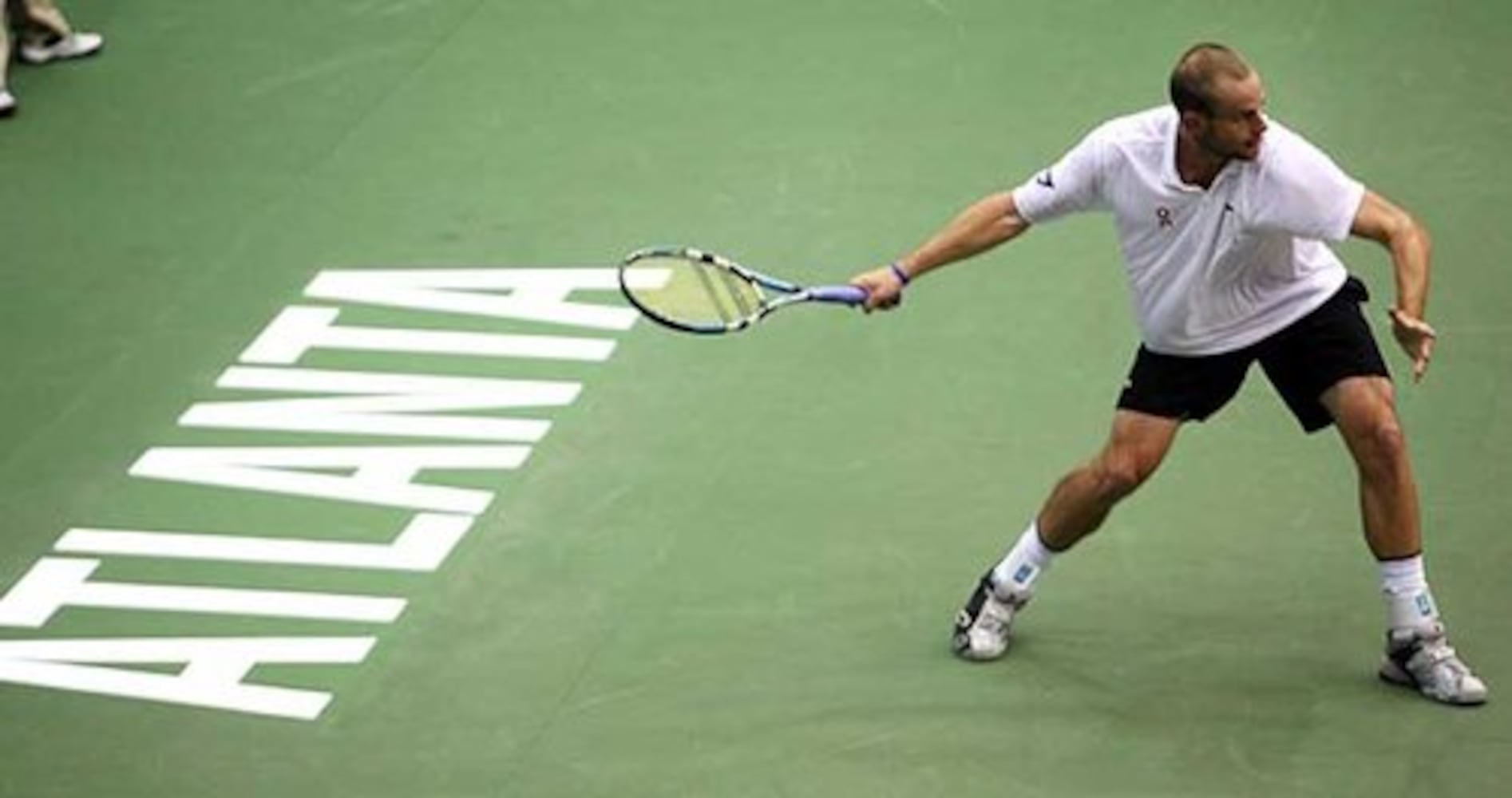 Elton John, tennis legends stage Atlanta tennis event to fight AIDS