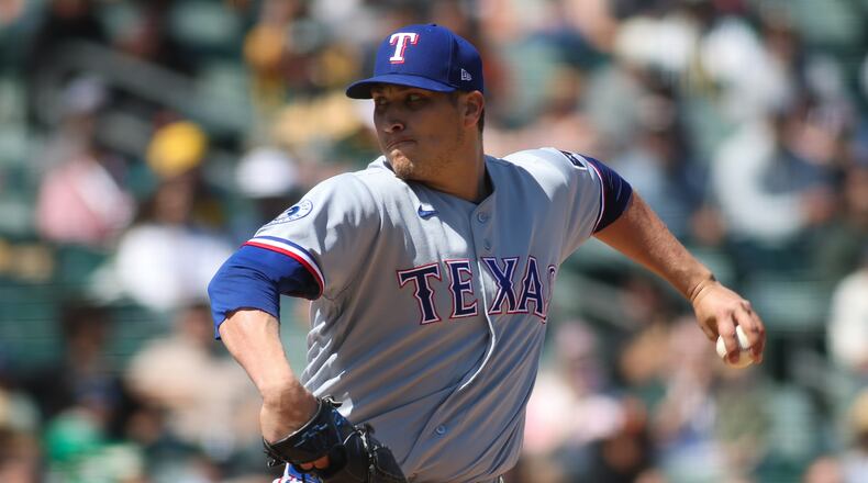 Texas Rangers pitcher Robert Garcia throws to an Athletics batter during the sixth inning of a baseball game Thursday, April 16, 2026, in West Sacramento, Calif. (AP Photo/Scott Marshall)
