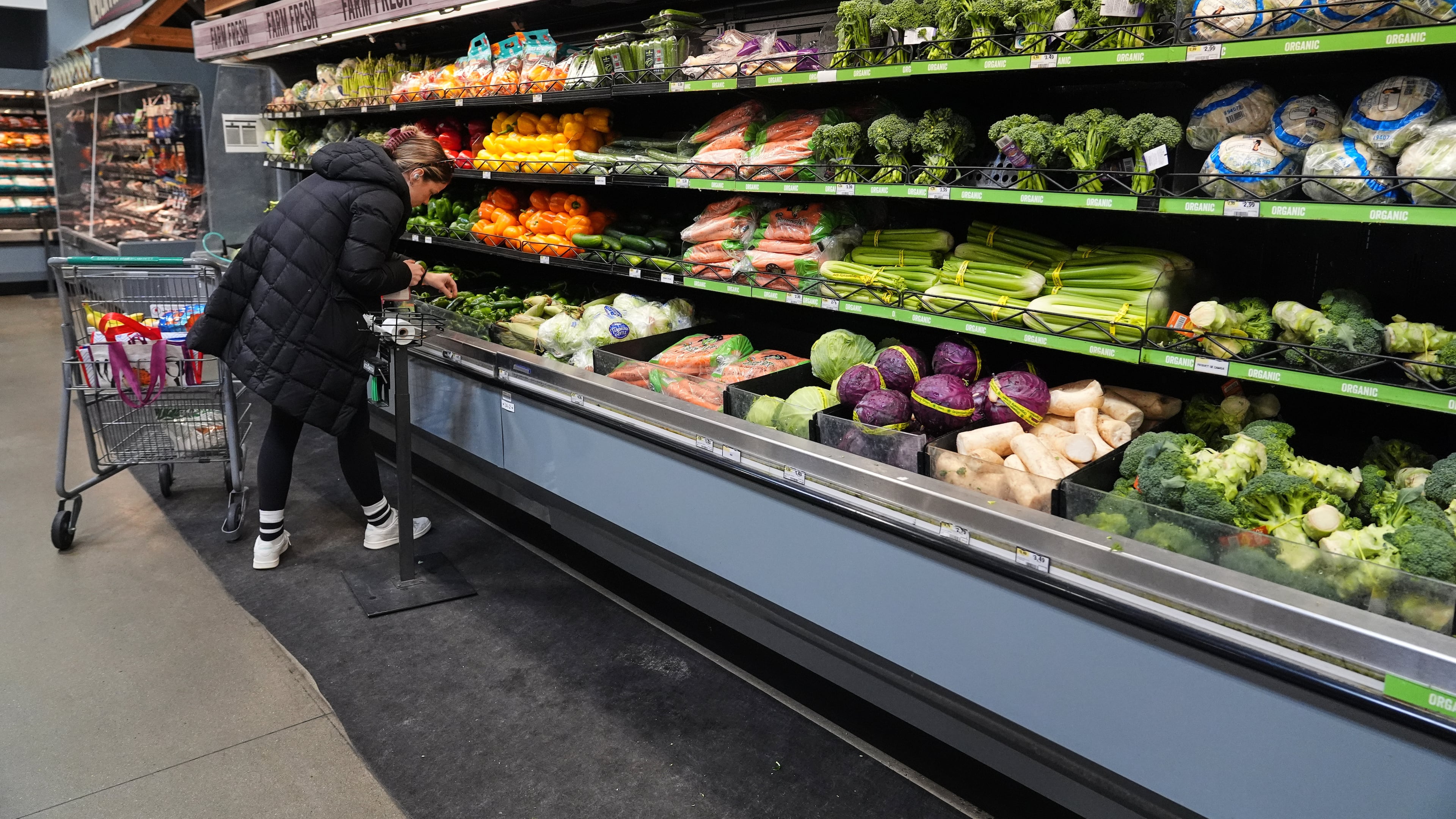 A person shops for produce, which is covered by the USDA Supplemental Nutrition Assistance Program (SNAP), at a grocery store in Baltimore, Monday, Nov. 10, 2025. (AP Photo/Stephanie Scarbrough)