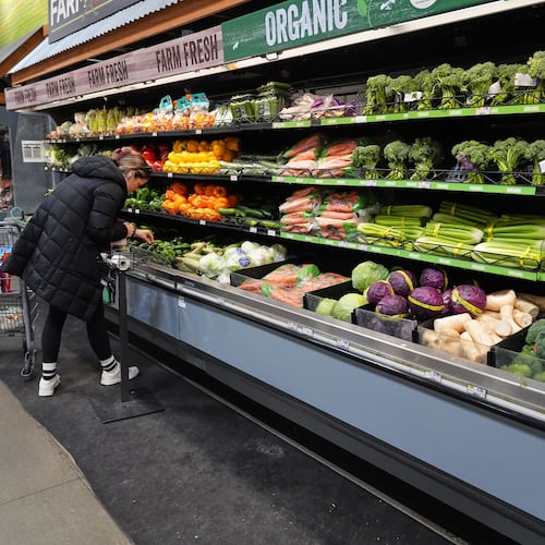A person shops for produce, which is covered by the USDA Supplemental Nutrition Assistance Program (SNAP), at a grocery store in Baltimore, Monday, Nov. 10, 2025. (AP Photo/Stephanie Scarbrough)