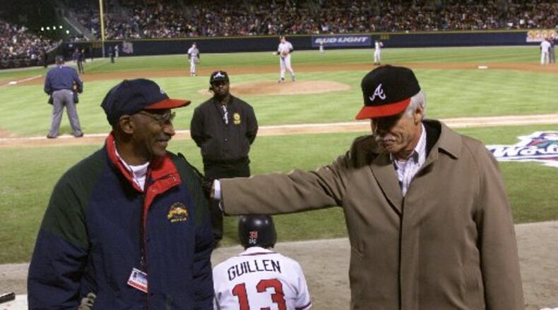 Walter Banks and Ted Turner at Turner Field. AJC file photo