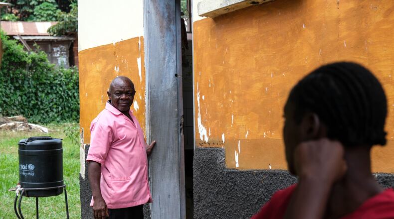 Samuel Kuule, a nurse and survivor of the first Ebola Bundibugyo strain in 2007, stands at Kikyo Health Centre IV in Kikyo Trading village, Bundibugyo District, Uganda, Wednesday, June 3, 2026. (AP Photo/Hajarah Nalwadda)
