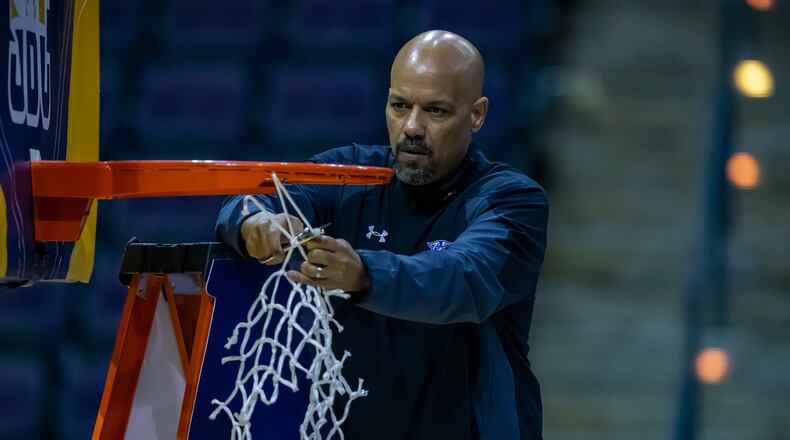 Georgia State coach Rob Lanier recently cut down the nets after the Panthers won the Sun Belt Championship game. Georgia State is looking for a new coach after Lanier was hired by Southern Methodist University on Sunday.