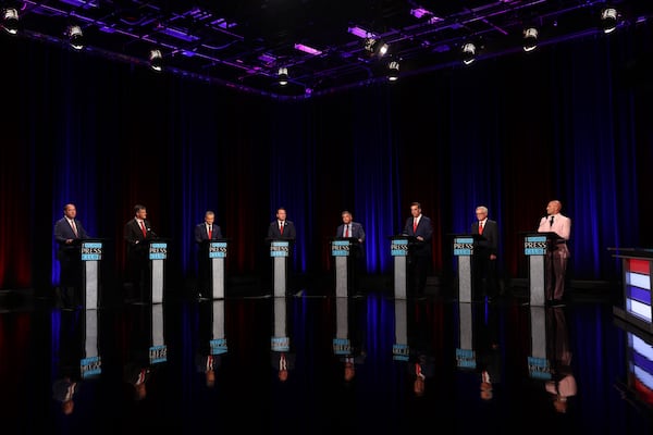 Republican candidates for governor Chris Carr (from left), Clark Dean, Rick Jackson, Burt Jones, Gregg Kirkpatrick, Brad Raffensperger, Tom Williams and Ken Yasger appear at the Atlanta Press Club Loudermilk-Young governor debate last month. (Arvin Temkar/AJC)