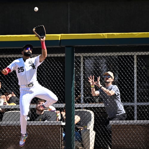 Chicago White Sox right fielder Derek Hill (25) catches a fly ball hit by Minnesota Twins' Tristan Gray during the seventh inning of a baseball game, Thursday, May 28, 2026, in Chicago. (AP Photo/Matt Marton)