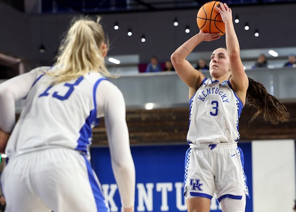 Kentucky's Georgia Amoore (3) shoots against Kansas State near teammate Clara Strack (13) in the second round of the NCAA college basketball tournament in Lexington, Ky., Sunday, March 23, 2025. (AP Photo/James Crisp)