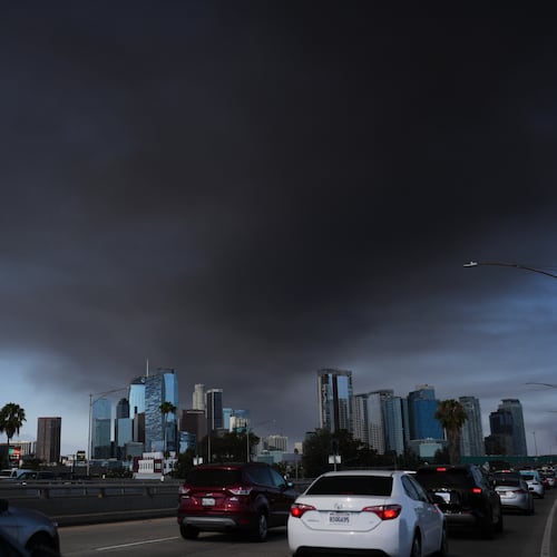 The sky is filled with smoke from a warehouse fire in Los Angeles on Wednesday, June 17, 2026. (AP Photo/Jae C. Hong)