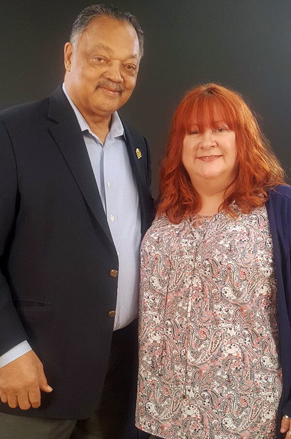 When I heard the Rev. Jesse Jackson was in the AJC photo studio, I had to run down to meet him. I also had to take a photo with him. (Courtesy of Nancy Clanton)