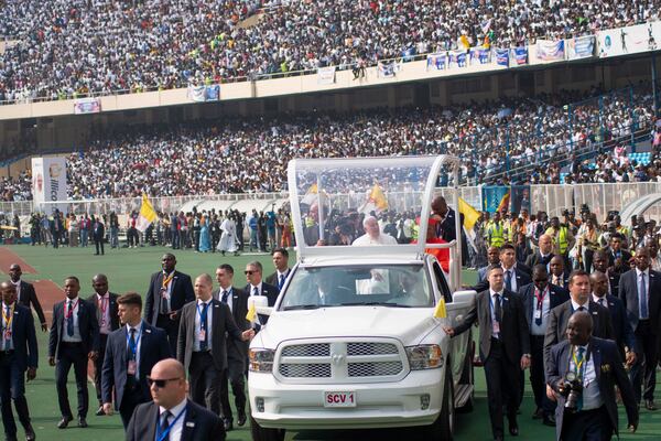 FILE - Pope Francis on the popemobile, waves at worshipers at the Martyrs' Stadium in Kinshasa, Congo, on Feb. 2, 2023. (AP Photo/Samy Ntumba Shambuyi, File)