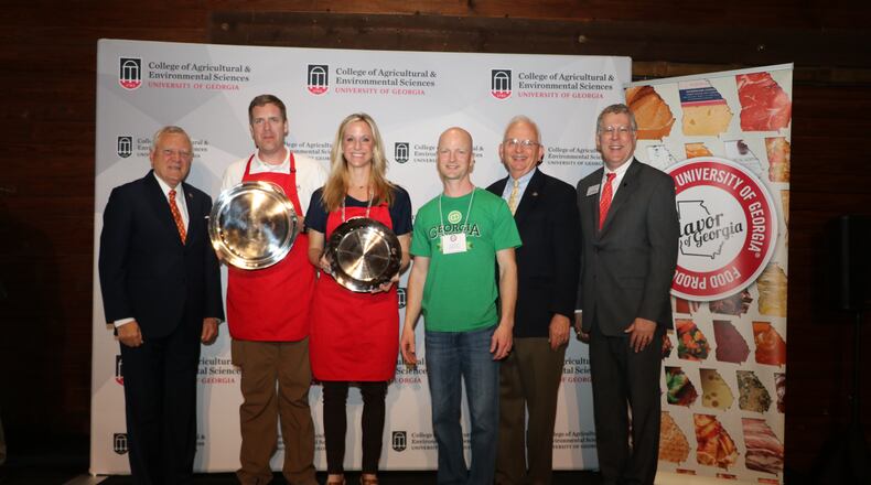 Governor Nathan Deal (from left), congratulates Harry and Jaime Foster and Travis Cole, of Georgia Grinders, who are accompanied by Georgia Agriculture Commissioner Gary Black and College of Agricultural and Environmental Sciences Dean and Director Sam Pardue. Georgia Grinder's Premium Nut Butters' Pecan Butter won the grand prize at the University of Georgia's Flavor of Georgia Food Product Contest.