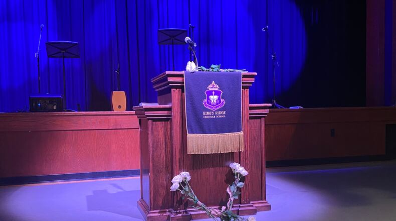 Friends, students and colleagues were in tears throughout the vigil held at King’s Ridge Christian School for Chris and Lori Leffler and their two sons Zack, 23, and Nate, 17, who died Saturday. A boat that also included the Leffler’s surviving daughter Katie and her friend was hit by another boat in which the driver was arrested for boating under the influence. Credit: Adrianne Murchison