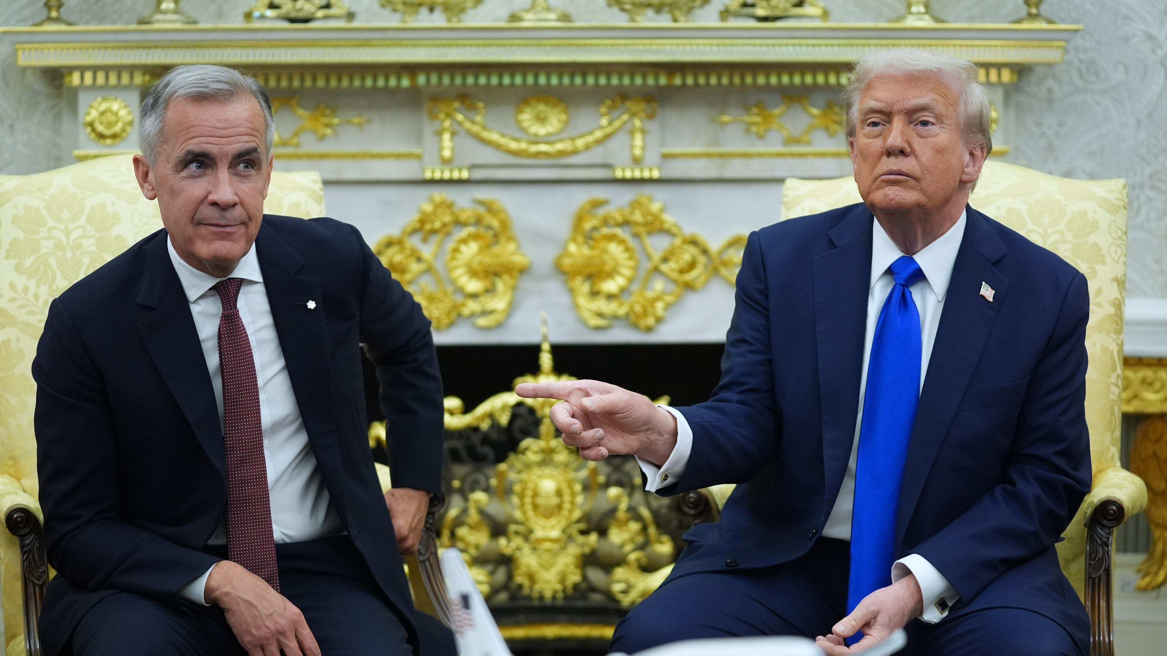 President Donald Trump and Canadian Prime Minister Mark Carney meet in the Oval Office of the White House, Tuesday, Oct. 7, 2025, in Washington. (AP Photo/Evan Vucci)