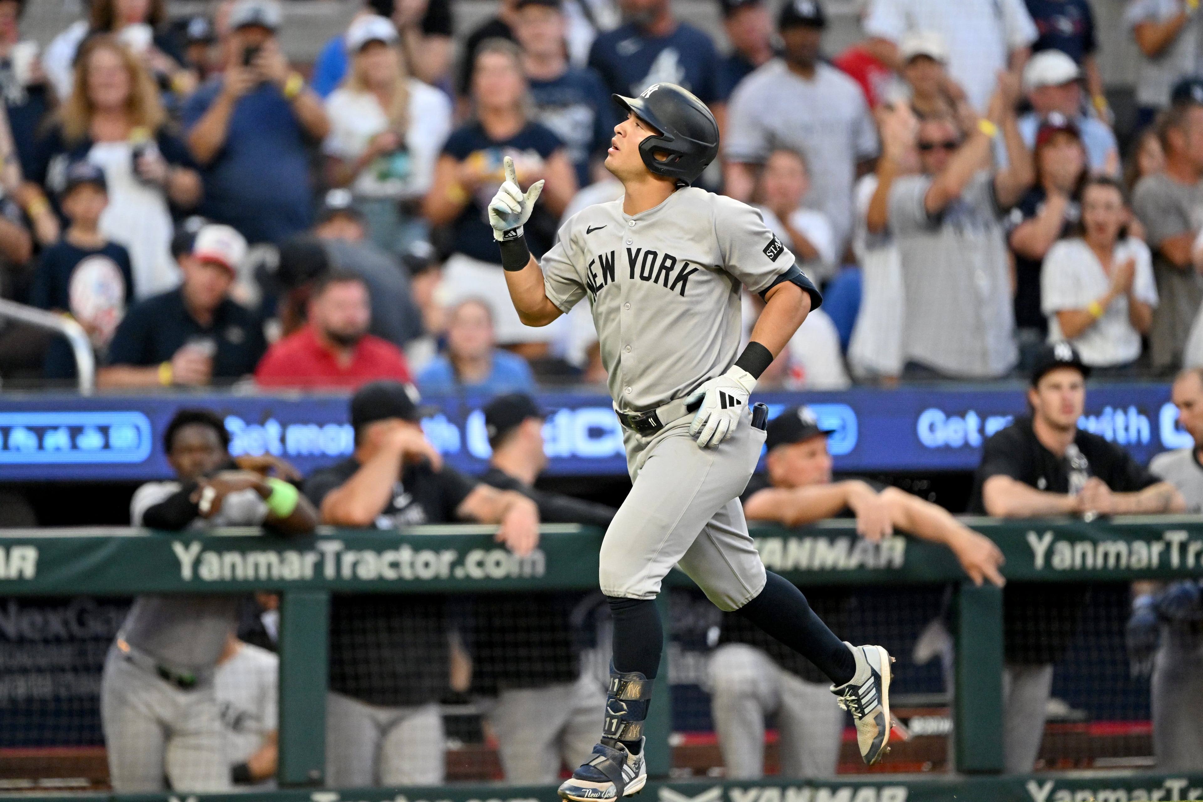 New York Yankees shortstop Anthony Volpe (11) celebrates as he circles the bases on a 2-run home run during the fifth inning of a baseball game at Truist Park, Saturday, July 19, 2025, in Atlanta. New York Yankees won 12-9 over Atlanta Braves. (Hyosub Shin / AJC)