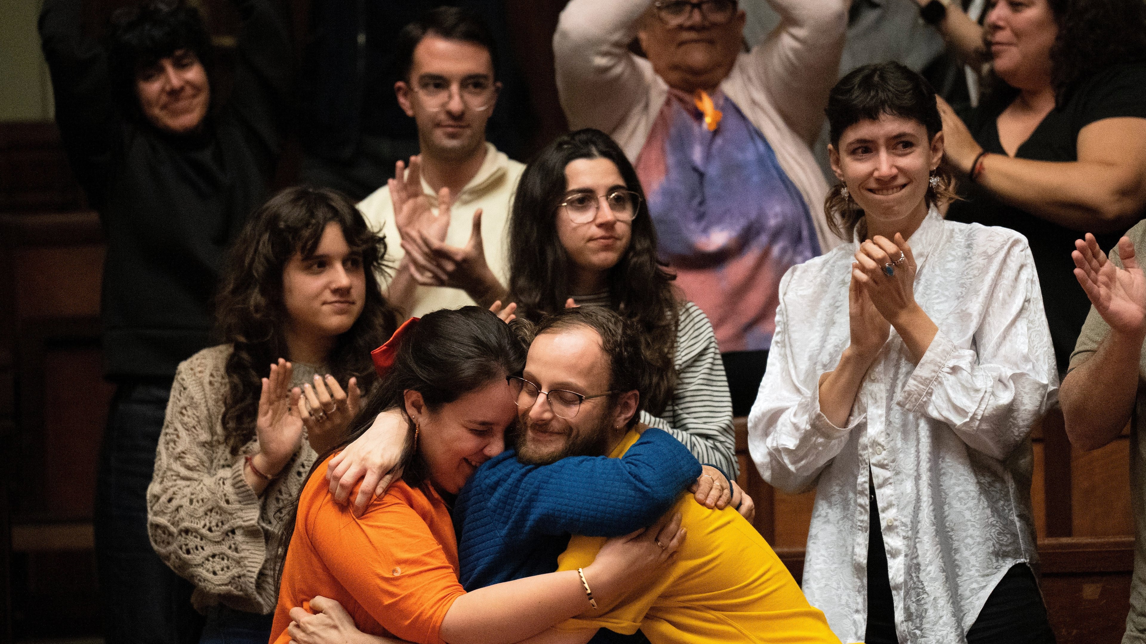 People celebrate after Uruguay's senate passed a law decriminalizing euthanasia, in Montevideo, Uruguay, Wednesday, Oct. 15, 2025. (AP Photo/Matilde Campodonico)