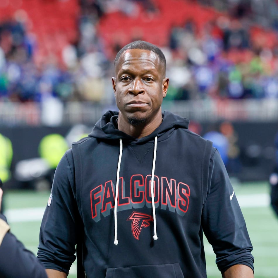Atlanta head coach Raheem Morris leaves the field after the Falcons lose to the Seahawks on Sunday. (Miguel Martinez/AJC)