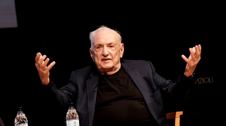 FILE - Architect Frank Gehry describes his concert hall design at the Colburn School during an unveiling in downtown Los Angeles on Wednesday, March 16, 2022. (AP Photo/Richard Vogel, File)