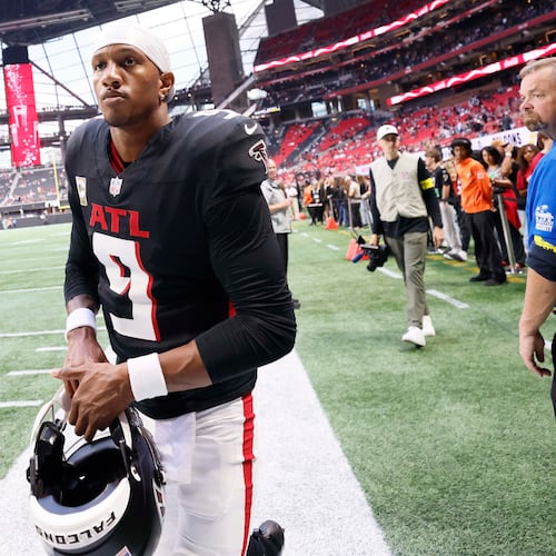 Atlanta Falcons quarterback Michael Penix Jr. leaves the field after warm-ups as the team prepares to face the Carolina Panthers at Mercedes-Benz Stadium in Atlanta on Sunday, Nov. 16, 2025. (Miguel Martinez/AJC)