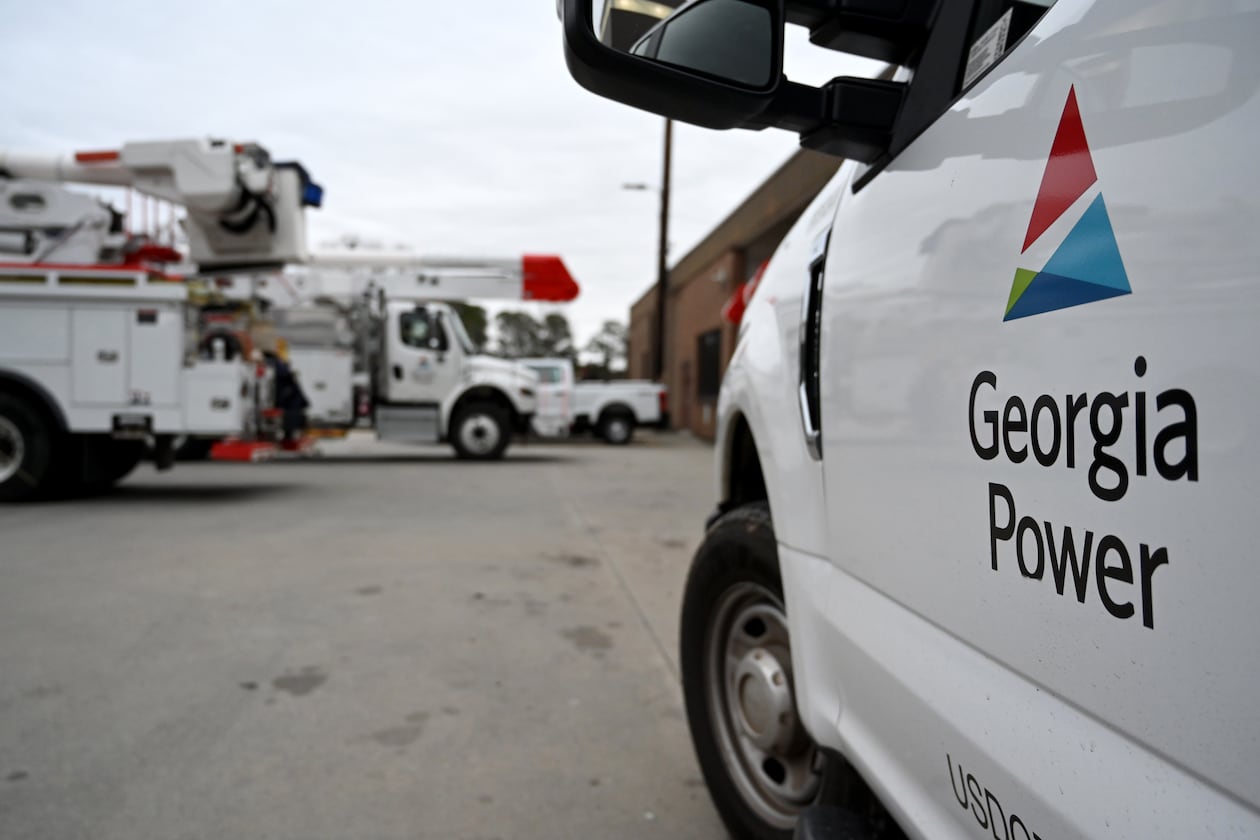Georgia Power trucks are shown staged at a site in metro Atlanta on Saturday, Jan. 24, 2026, in Atlanta. (Hyosub Shin/AJC)