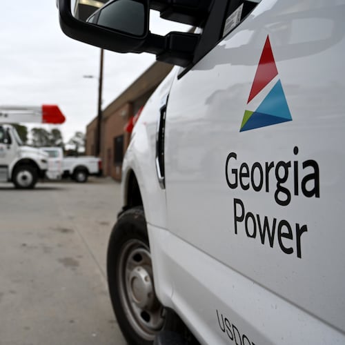 Georgia Power trucks are shown staged at a site in metro Atlanta on Saturday, Jan. 24, 2026, in Atlanta. (Hyosub Shin/AJC)