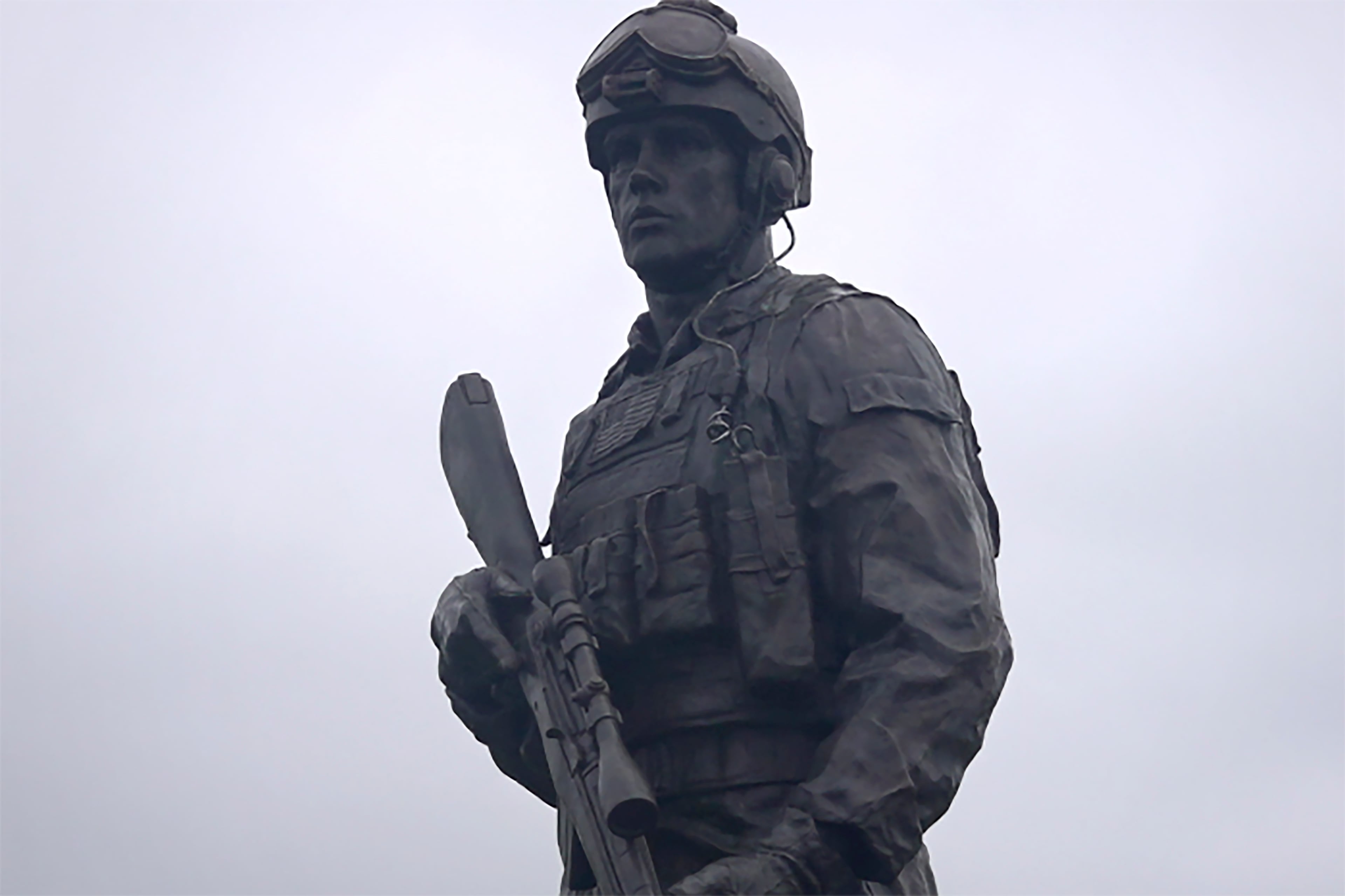 A statue of Master Sgt. Gary Gordon in Lincoln, Maine. Gordon, who died in 1993 while attempting to rescue a downed U.S. helicopter pilot in Mogadishu, was posthumously awarded the Medal of Honor. (Mark Rediker/WABI-TV5 via AP 2021)