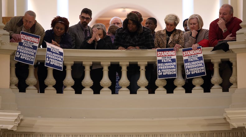 January 13, 2015 Atlanta: An overflow crowd lines the railings above the Capitol Rotunda during a rally in support of fired Atlanta Fire Chief Kelvin Cochran on Tuesday afternoon January 13, 2015. BEN GRAY / BGRAY@AJC.COM An overflow crowd lines the railings above the Capitol Rotunda during a January 2015 rally in support of religious liberty bills before the Legislature. Ben Gray, bgray@ajc.com