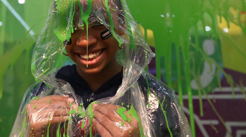 February 4, 2017, Houston: Samarhi Smalls, Houston, gets slimed at the Nickelodeon booth during the NFL Experience on Saturday Feb. 4, 2017, in Houston.    Curtis Compton/ccompton@ajc.com