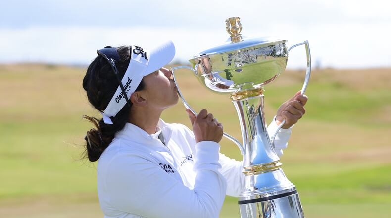 Jenny Shin of South Korea celebrates winning the 2026 ISPS HANDA Women's Scottish Open at Dundonald Links, Ayrshire, Sunday July 26, 2026. (Steve Welsh/PA via AP)