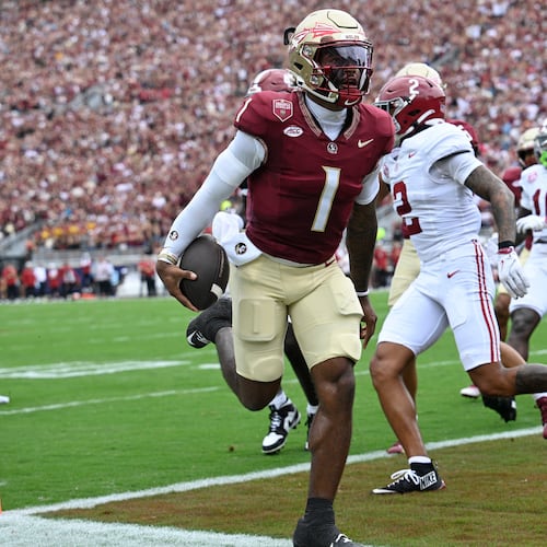 FILE - Florida State quarterback Tommy Castellanos (1) rushes for a touchdown against Alabama during the first half of an NCAA college football game, Saturday, Aug. 30, 2025, in Tallahassee, Fla. (AP Photo/Phelan M. Ebenhack,File)