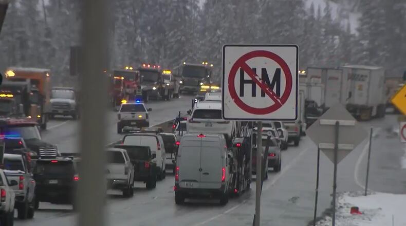 This grab from video shows traffic backed up after a multi-vehicle pile up on a section of a snowy highway in Clear Creek County, Colorado, Tuesday, April 14, 2026. (KMGH/Denver7 via AP)
