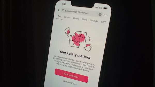 When you search "Chromebook Challenge" on TikTok, you get a safety message rather than videos of kids trying to set their laptops on fire. Students across the country are being disciplined for participating in the latest trend. (Cassidy Alexander/AJC)