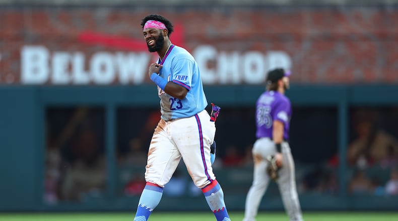 Atlanta Braves' Michael Harris II reacts after hitting a 2-RBI double in the eighth inning of a baseball game against the Colorado Rockies, Saturday, Aug. 29, 2026, in Atlanta. (AP Photo/Colin Hubbard)