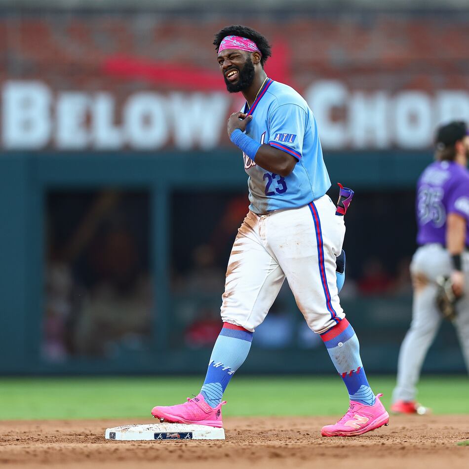 Atlanta Braves' Michael Harris II reacts after hitting a 2-RBI double in the eighth inning of a baseball game against the Colorado Rockies, Saturday, Aug. 29, 2026, in Atlanta. (AP Photo/Colin Hubbard)