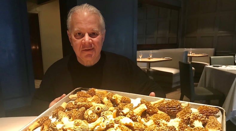 Aria chef-owner Gerry Klaskala with a tray of newly arrived golden morels. Klaskala, who calls himself “weirdly visual,” planned to feature the mushrooms in a simple preparation with minimal ingredients. Culling from his mental inventory of flavors, tastes and textures, Klaskala said that “my mind starts to imagine those ingredients.” Photo by Ligaya Figueras/lfigueras@ajc.com