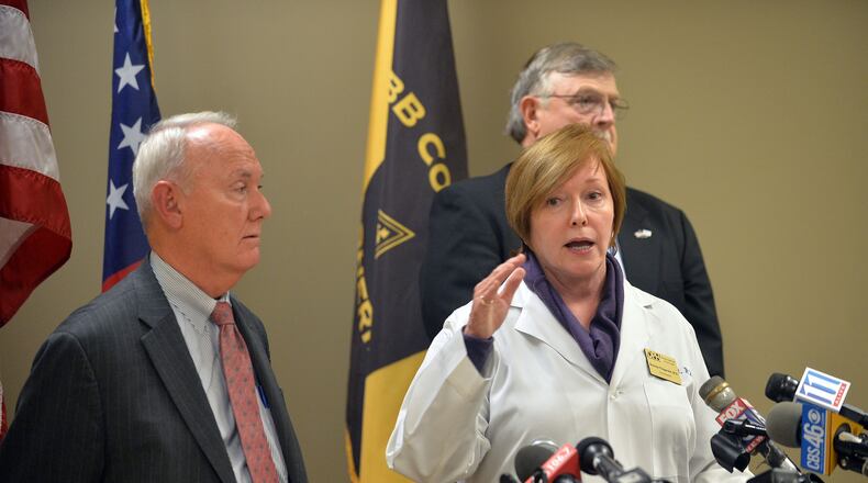 Dr Fitzgerald talks about precautions the public can take against Ebola infection. Dr. James O'Neal, Director of Health Protection (left), Dept of Public Health, Dr Brenda Fitzgerald, commissioner of the Georgia Dept of Public Health, and Neil Warren, Cobb County Sheriff talk about an Ebola investigation of an inmate that was arrested early Friday morning. Officials with the Georgia Department of Public Health and Cobb County Sheriff's Office update the media on the investigation of a potential Ebola patient during a press conference at the Cobb County Jail, Friday, October 3, 2014.