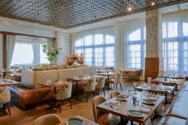 The dining room at Rumi's Kitchen in Alpharetta is airy and elegantly appointed. (Courtesy of Rumi's Kitchen)