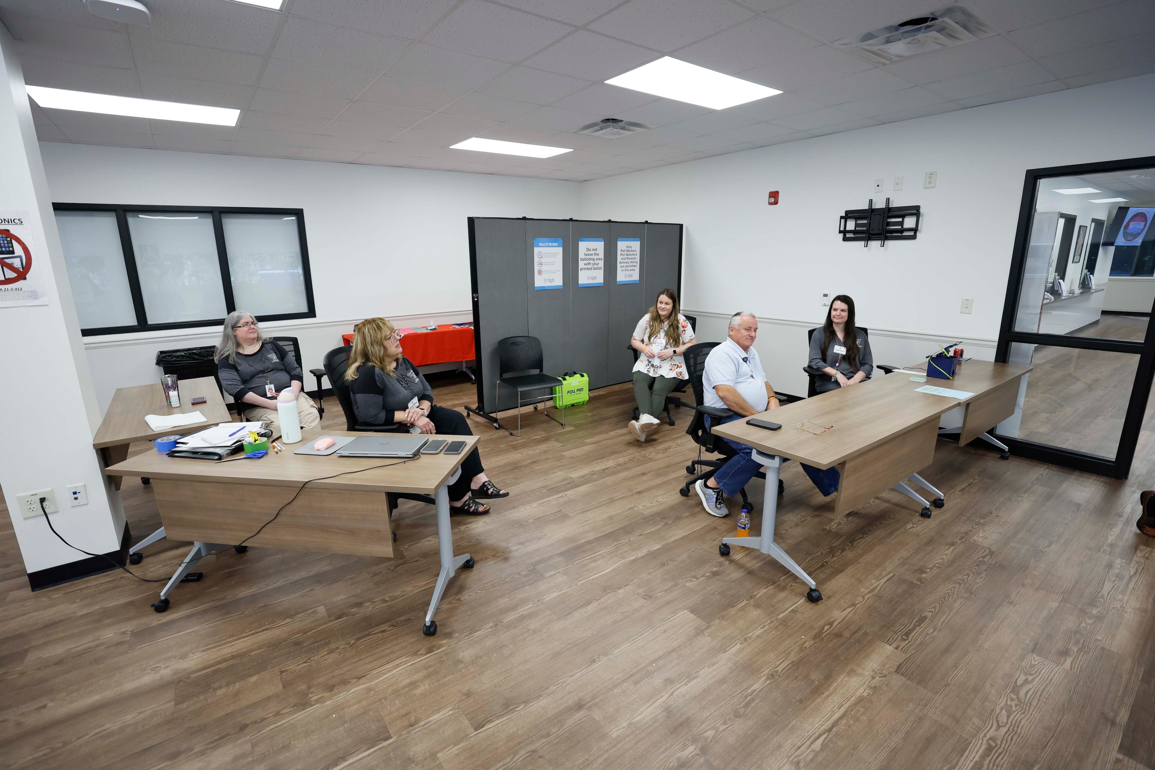 Cherokee County Voting and Registration office employees and poll workers wait for voters to come in during the runoff elections for the Public Service Commission on Tuesday, July 8, 2025. (Miguel Martinez/AJC)