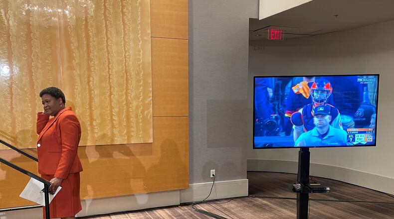 City Council President Felicia Moore prepares to celebrate her spot in the Atlanta mayoral runoff as the Braves take the field in the bottom of the ninth inning at the World Series.