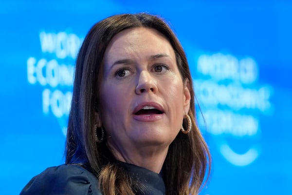 FILE - Arkansas Gov. Sarah Huckabee Sanders speaks at the Annual Meeting of World Economic Forum in Davos, Switzerland, Jan. 23, 2025. (AP Photo/Markus Schreiber, File)