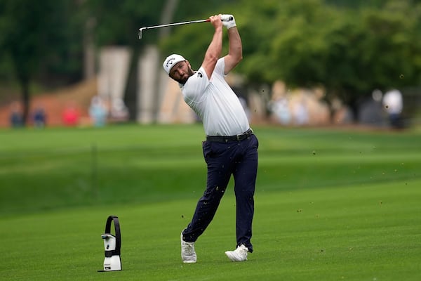 Jon Rahm, of Spain, hits from the fairway on the second hole during a practice round for the PGA Championship golf tournament at the Quail Hollow Club, Wednesday, May 14, 2025, in Charlotte, N.C. (AP Photo/David J. Phillip)