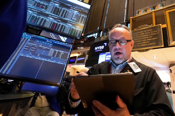 Trader Robert Arciero works on the floor of the New York Stock Exchange, Monday, April 21, 2025. (AP Photo/Richard Drew)