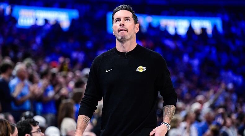 Los Angeles Lakers Head Coach JJ Redick reacts during the first half of an NBA basketball game against the Oklahoma City Thunder Thursday, April. 2, 2026, in Oklahoma City. (AP Photo/Gerald Leong)
