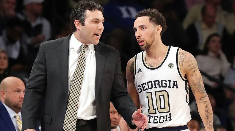 Georgia Tech coach Josh Pastner confers with guard Jose Alvarado in a tight contest with Duke on Wednesday, January 8, 2020, in Atlanta.  Curtis Compton ccompton@ajc.com
