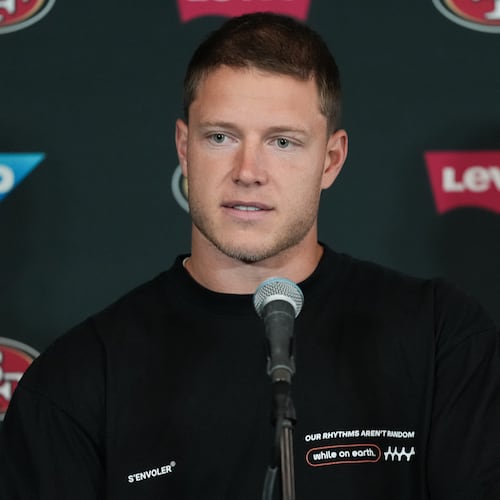 San Francisco 49ers running back Christian McCaffrey speaks to the media ahead of practice Monday, Sept. 7, 2026, in Melbourne, Australia, in preparation for an NFL football game against the Los Angeles, Rams. (AP Photo/Asanka Brendon Ratnayake)