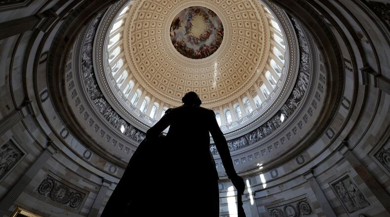 The statue of President George Washington stands in the recently renovated Rotunda of the Capitol in Washington, Thursday, Nov. 17, 2016. (AP Photo/Alex Brandon)
