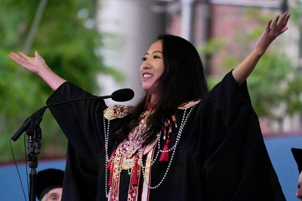 Yurong "Luanna" Jiang addresses classmates during commencement ceremonies at Harvard University, Thursday, May 29, 2025, in Cambridge, Mass. (AP Photo/Charles Krupa)