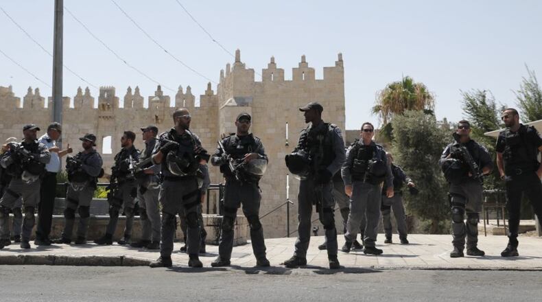 Israeli security forces stand guard in Jerusalem's Old City after Friday's shooting attack.