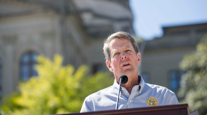 Georgia Gov. Brian Kemp makes remarks during a press conference at Liberty Plaza. (ALYSSA POINTER / ALYSSA.POINTER@AJC.COM)