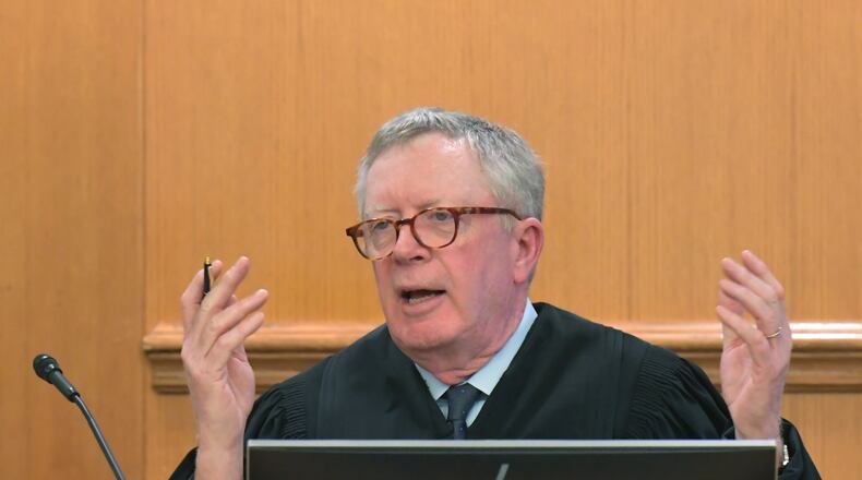 May 9, 2019 Lawrenceville - Fulton County Superior Court Judge John Goger speaks during a court hearing to determine if Superior Court Judge Kathryn Schrader will formally recuse herself from presiding over hundreds of cases being prosecuted by District Attorney Danny Porter, who she has accused of trying to hack into her computer, at Gwinnett Justice and Administration Center on Thursday, May 9, 2019. HYOSUB SHIN / HSHIN@AJC.COM